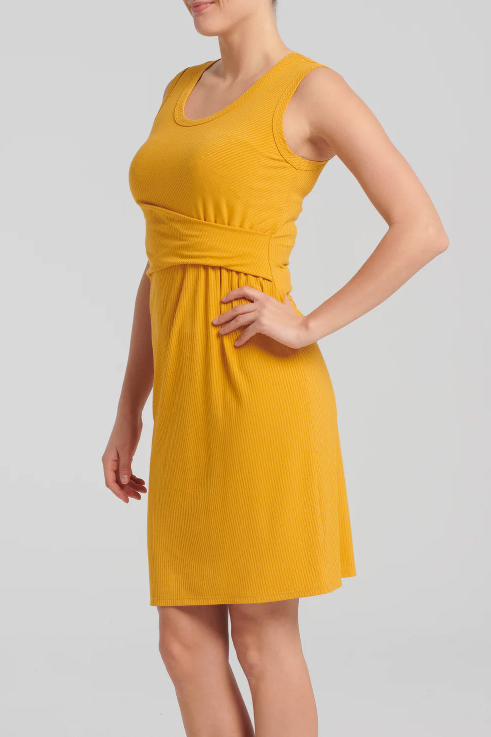 Saranya Dress by Kollontai, Topaz, side view, sleeveless, scoop neck, wide straps, bamboo rib-knit, pleat details at waist, straight cut, knee length, sizes XS to XXL, made in Quebec