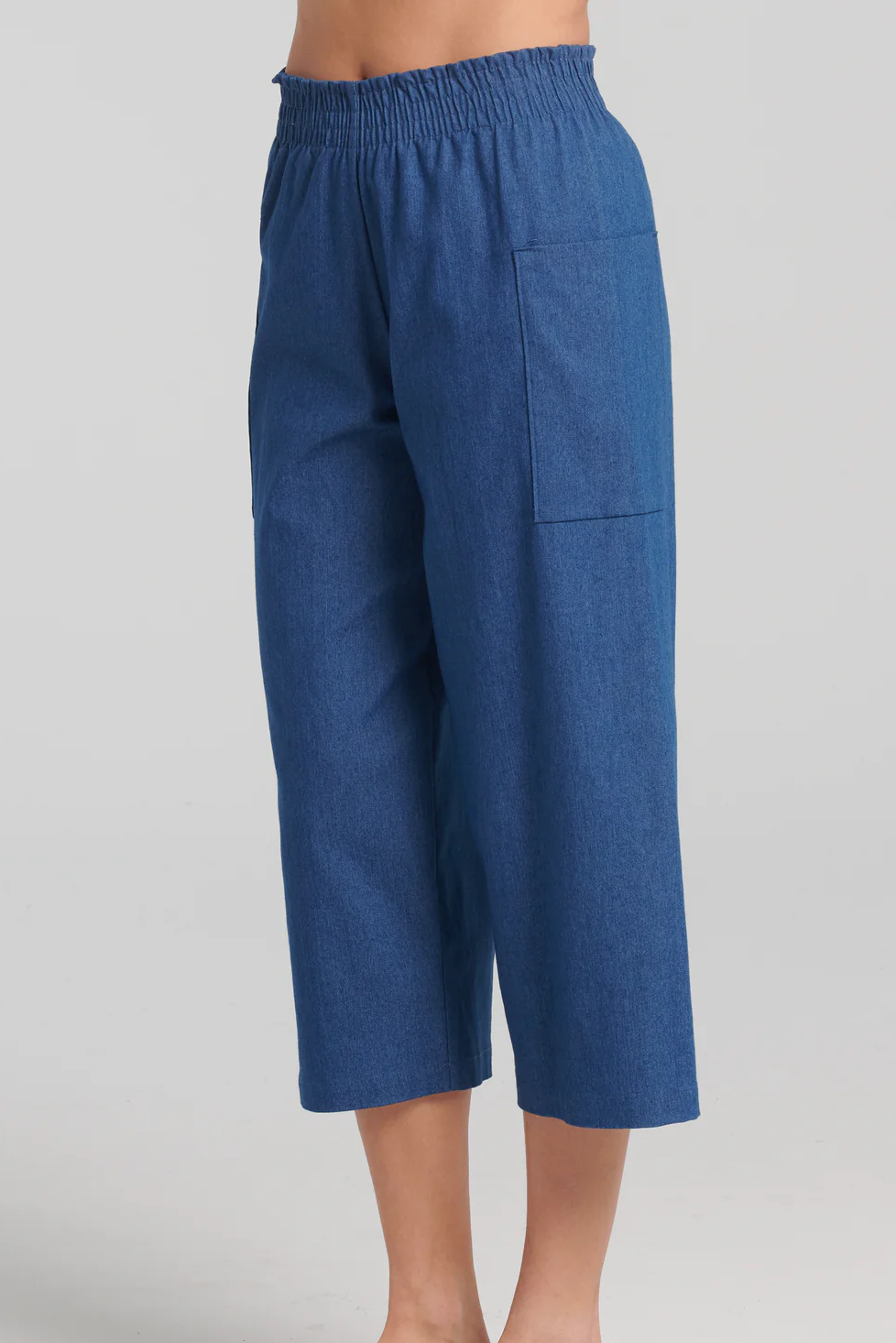 Anona Pants by Kollontai, Blue, lightweight denim, cropped length, elastic waist, side pouch pockets, sizes XS to XXL, made in Montreal 
