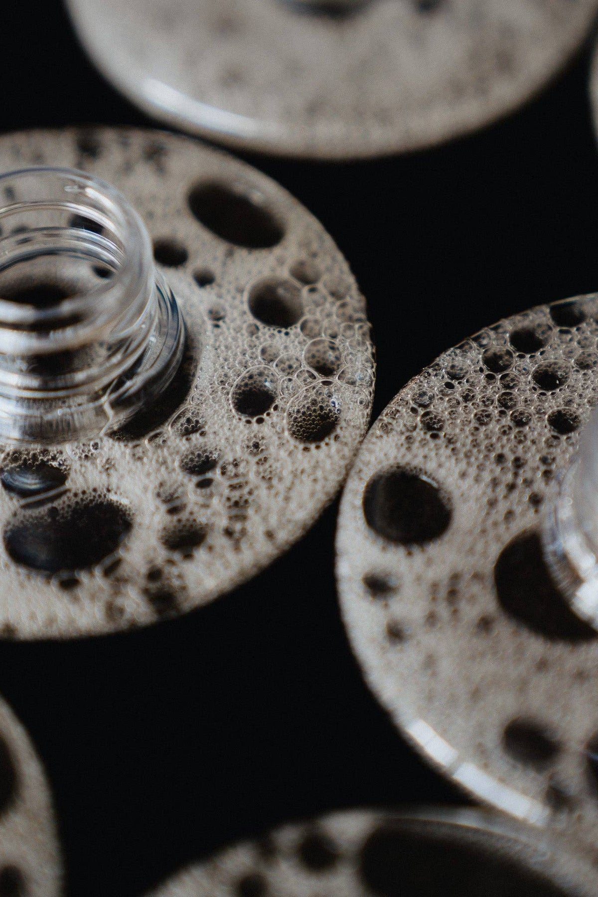 Close-up of open Picot body wash bottles