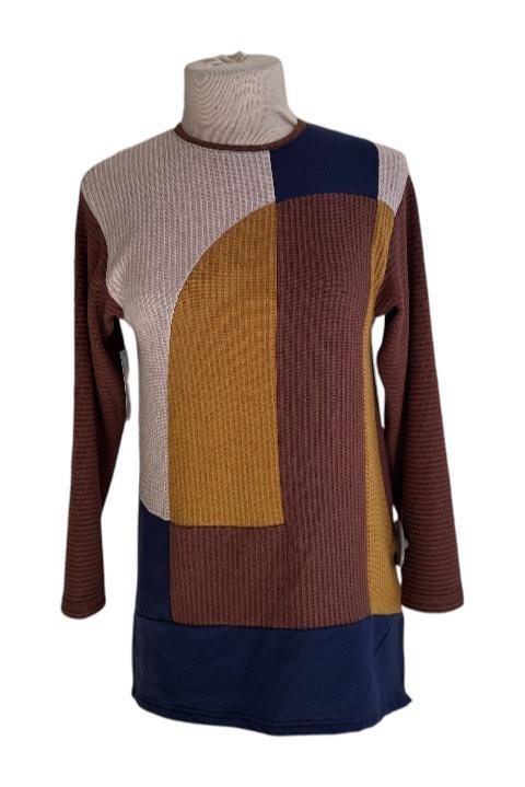 The Gladis Top by Solomia, featuring a colour-blocked front in Yellow/Cream/Blue/Brown and a solid Brown back, with a round neck and long sleeves, show on a mannequin in front of a white background. 