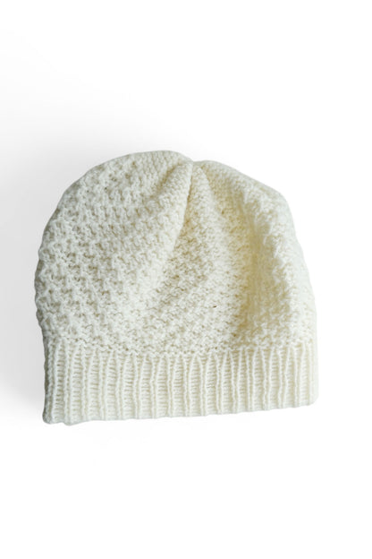 The Beret by Charlevoix Pure Laine in Natural is shown against a white background. 