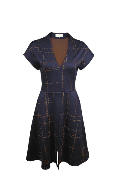 The Josee Dress by Melow in Indigo is show against a white background 