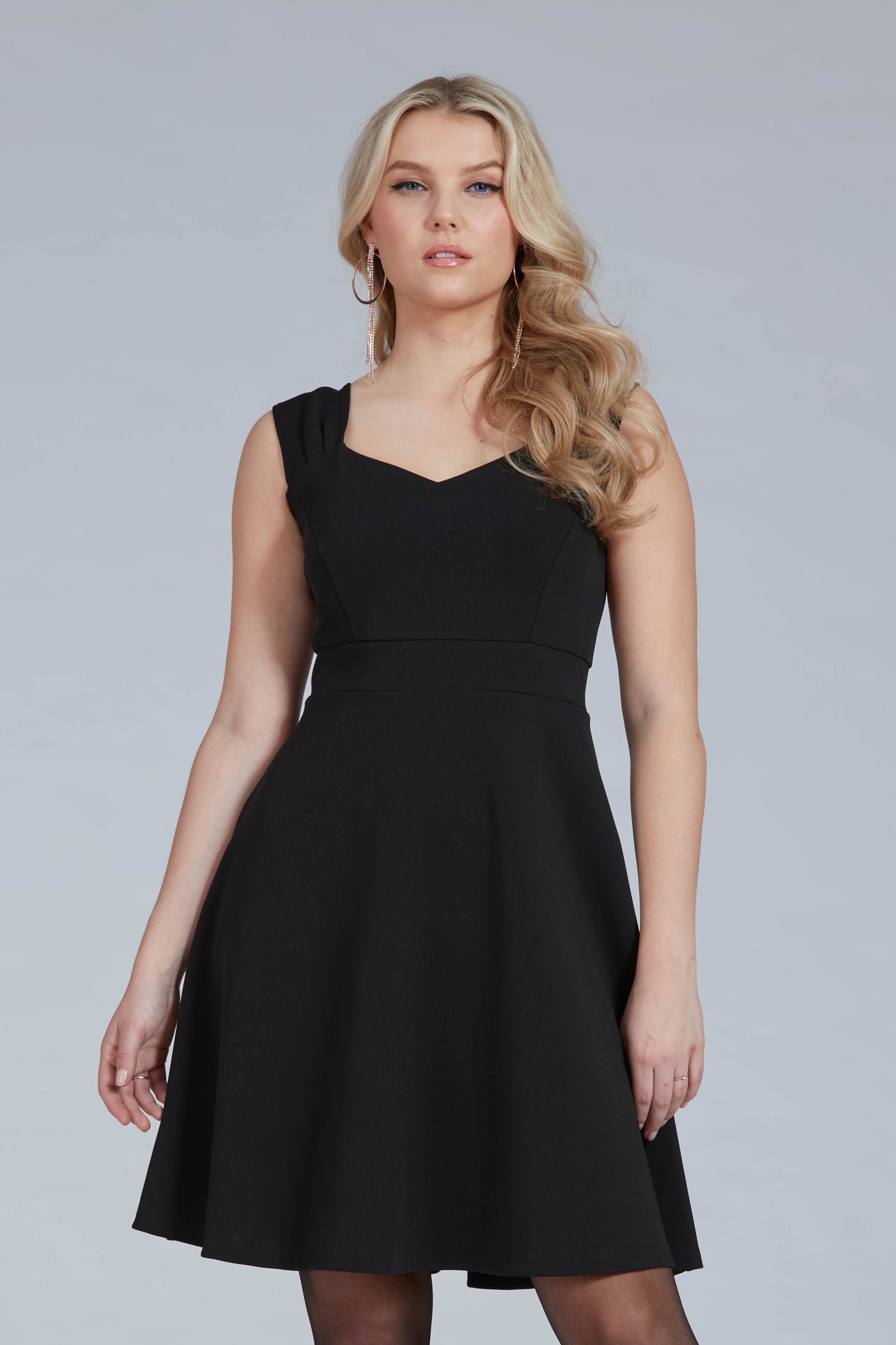 Trudy Dress by Luc Fontaine, Black, sleeveless, sweetheart neckline, fit and flare, darts at bust, waistband, sizes 4-16, made in Canada.