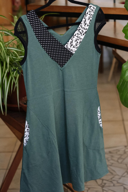Maya Dress by Marie C, Green, V-neck, patterned fabric panels at neckline, dotted mesh cap sleeves, fit and flare shape, above the knee, pockets, eco-fabric, Tencel, organic cotton, sizes XS to XL, made in Montreal 