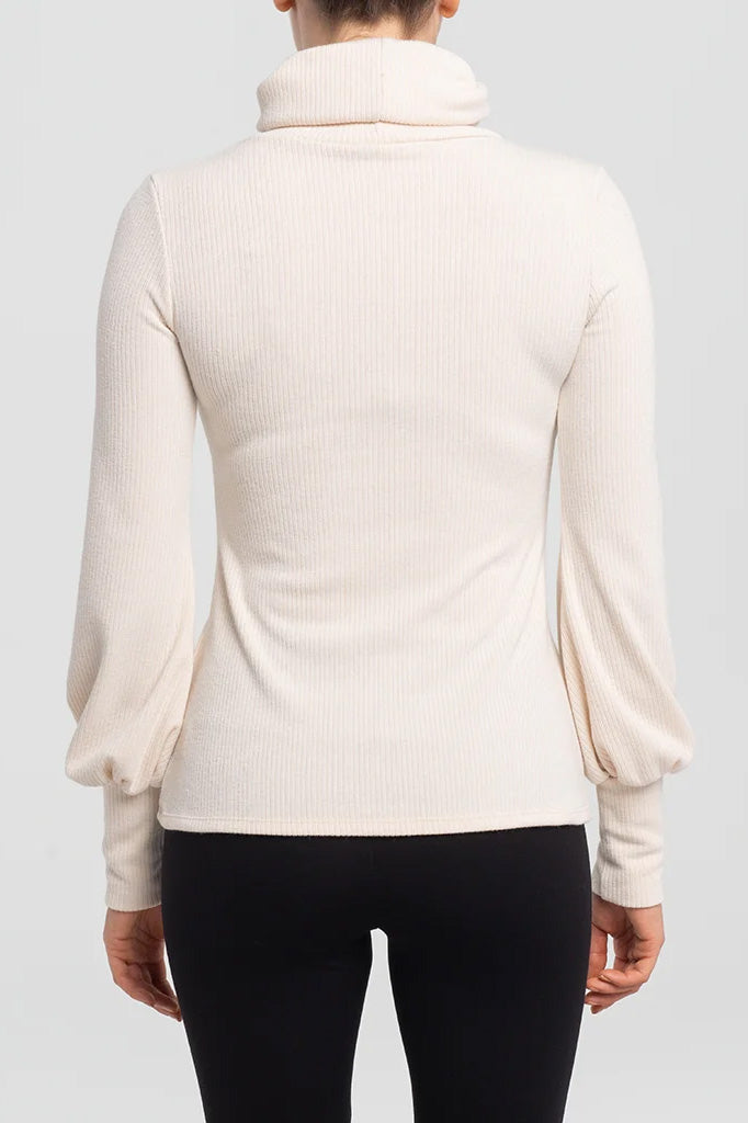 Monck Sweater by Kollontai, Cream, back view, turtleneck, slight puff detail at wrists, long ribbed cuffs, rib knit, sizes XS to XL, made in Montreal