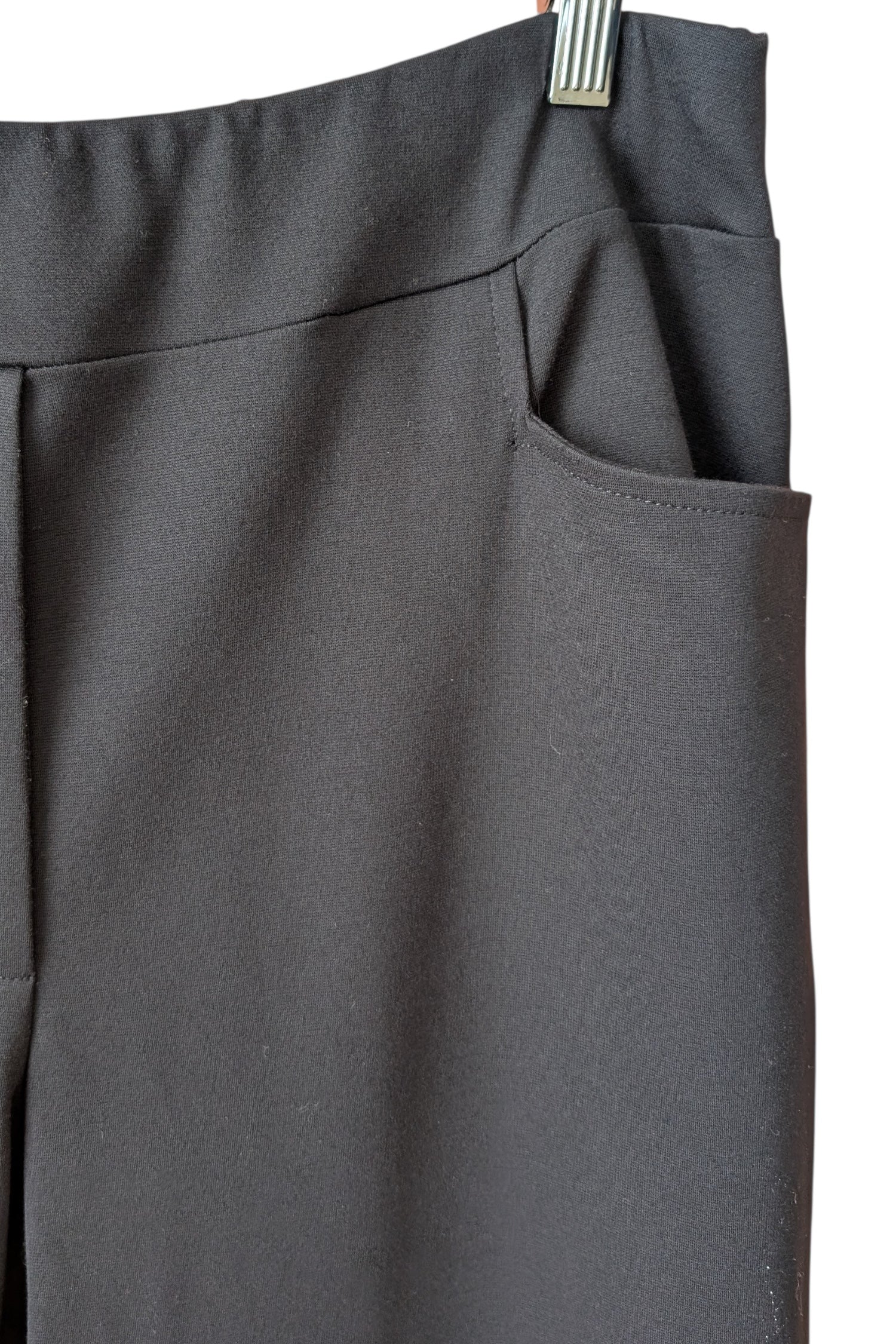 Pocket and waistband detail of the Freddie Pants by Pure Essence in Black.