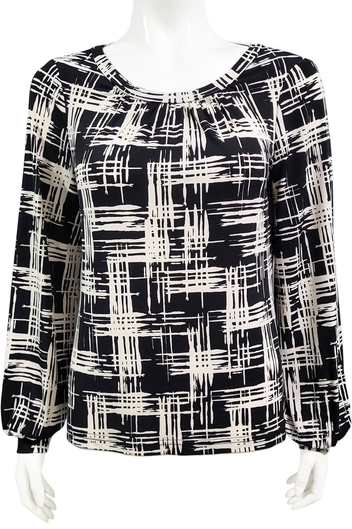 The Gwen Blouse by Mandala in Hopscotch - Black print is shown on a mannequin against a white background.