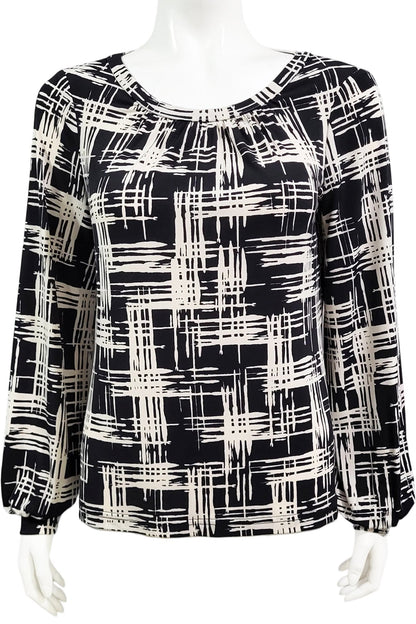 The Gwen Blouse by Mandala in Hopscotch - Black print is shown on a mannequin against a white background.