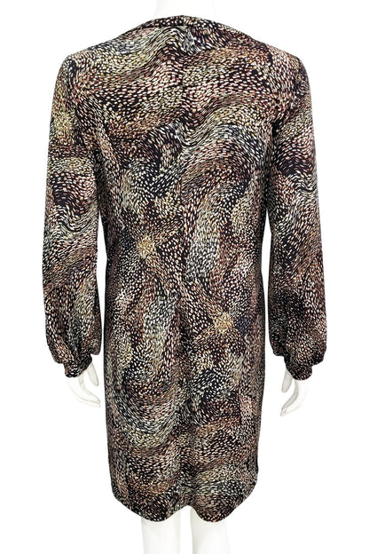 A back view of the Gwyneth mini dress from Mandala in Starry Night - Brown is shown on a mannequin against a white background 