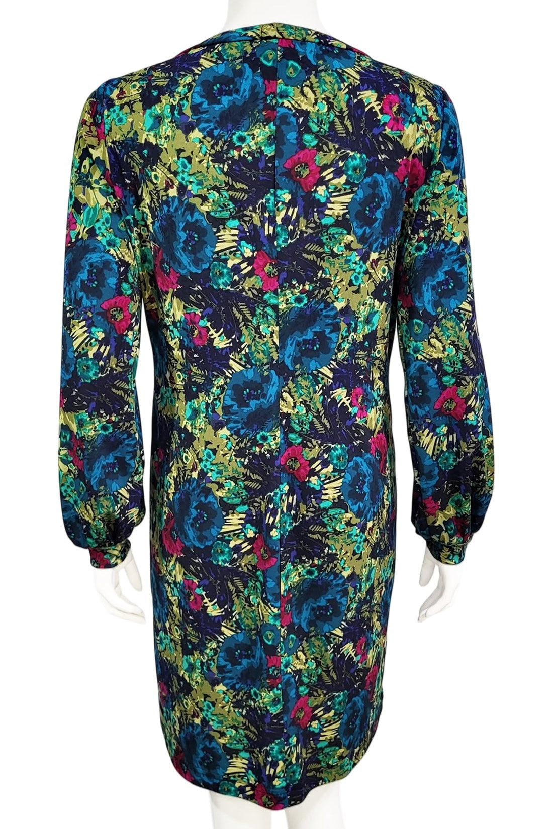 A back view of the Gwyneth mini dress from Mandala in Vintage Roses is shown on a mannequin against a white background 