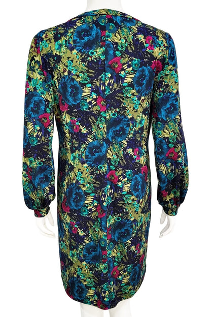 A back view of the Gwyneth mini dress from Mandala in Vintage Roses is shown on a mannequin against a white background 