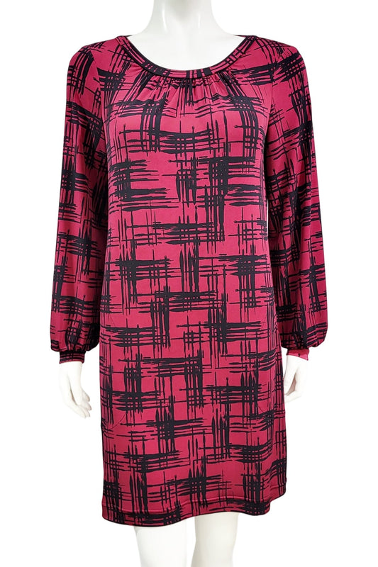 The Gwyneth mini dress from Mandala in Hopscotch - Cherry is shown on a mannequin against a white background 
