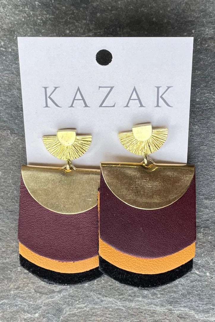 Roma Burgundy/Mustard/Suede earrings on a 'KAZAK' branded card against a grey background