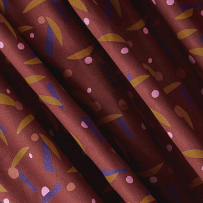 Playtime Rust print swatch for the Cecil Box Blouse by Mandala