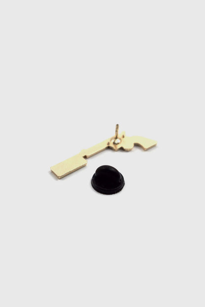 A back view of The Bad Bitch Pin by Badaboöm Studio is shown against a white background. 