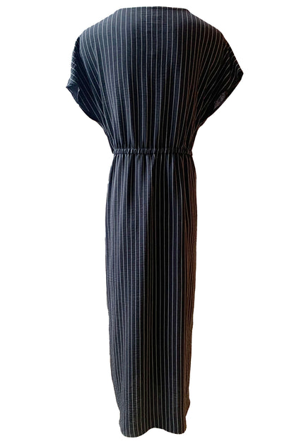 A back view of the the Clementine Dress by Pure Essence in Black pinstripe is shown on a mannequin in front of a white background