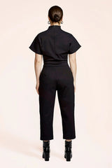 Herby Jumpsuit by Melow, Black, back view, high collar, plunging neckline, fitted waist, short sleeves, 7/8 length legs, pockets, sizes XS to XXL, made in Montreal