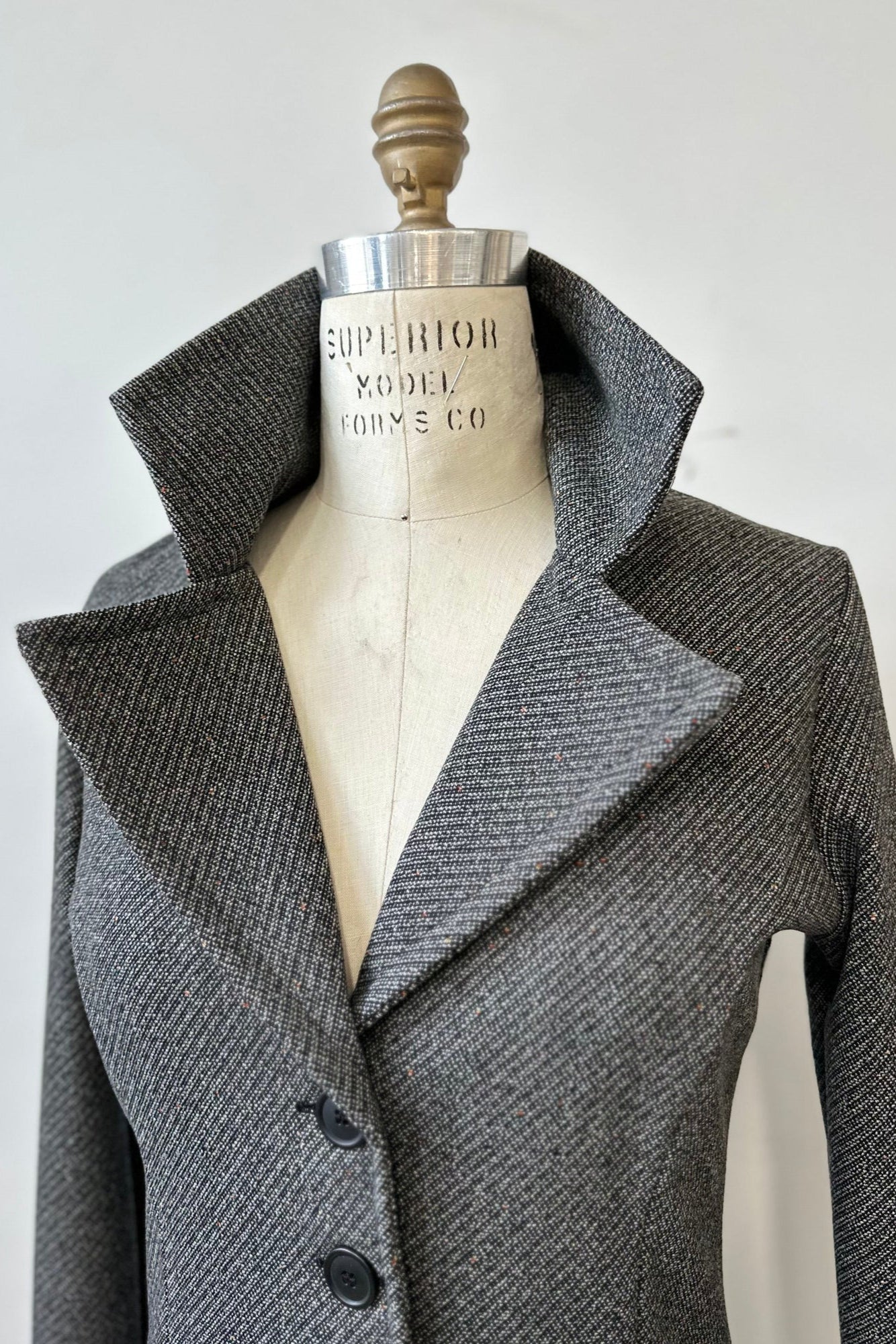 Collar detail of the Henderson Jacket by Kollontai in Charcoal tweed.