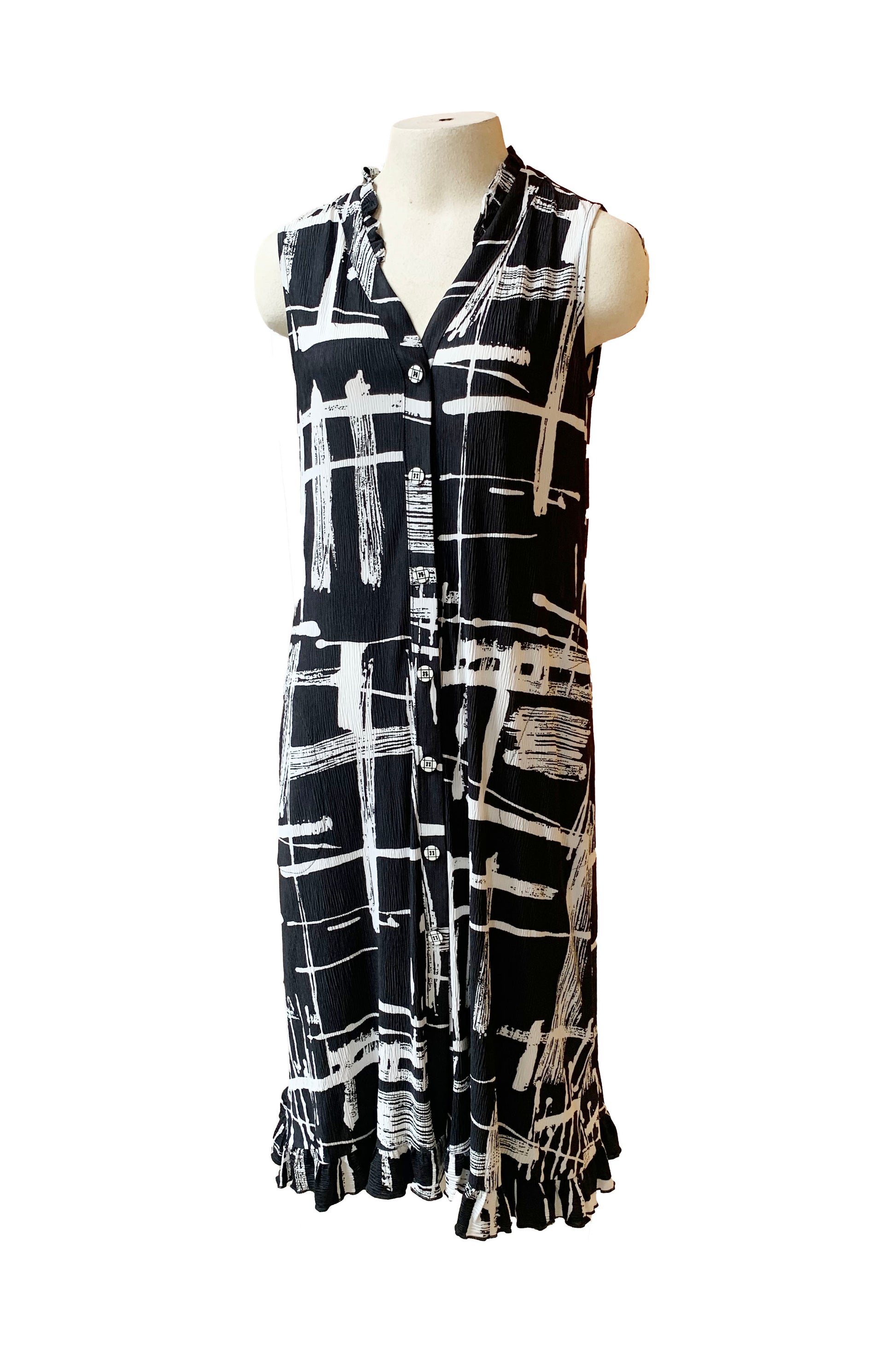 The Cordelia Dress by Pure Essence in Black/White Print is shown on a mannequin in front of a white background 