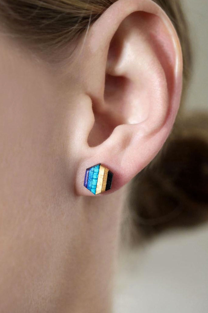 Hexagon stud earrings made from repurposed skateboards