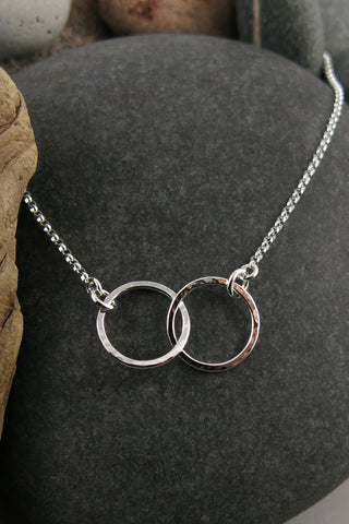 Hearts Embrace Necklace: Sterling Silver