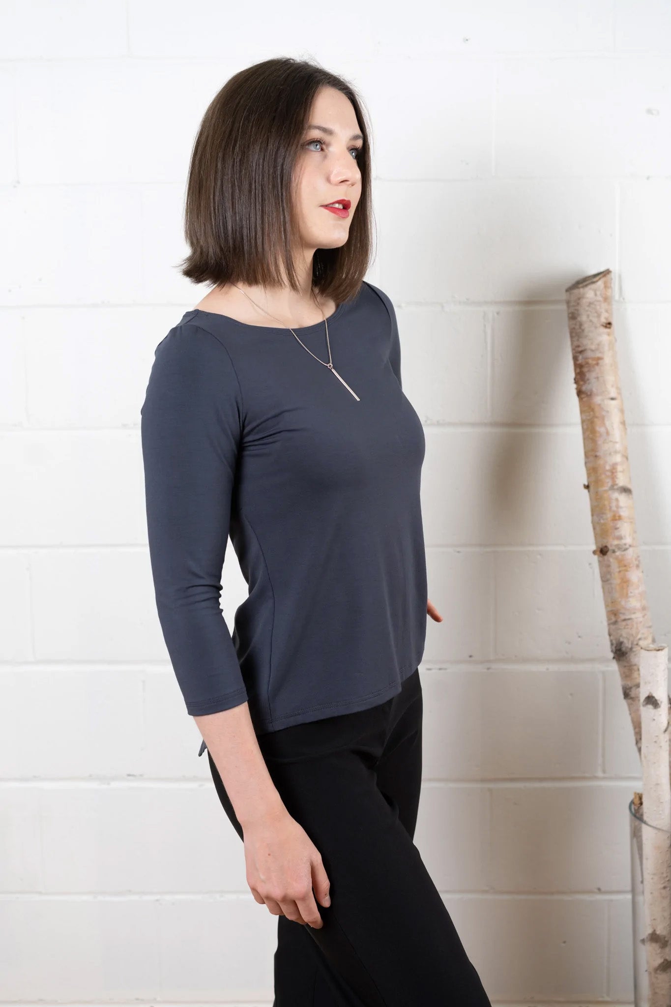 3/4 Sleeve Fela Top by Studio D, Charcoal, side view, boatneck, 3/4 sleeves, split back, sizes XS to XL, made in Ottawa