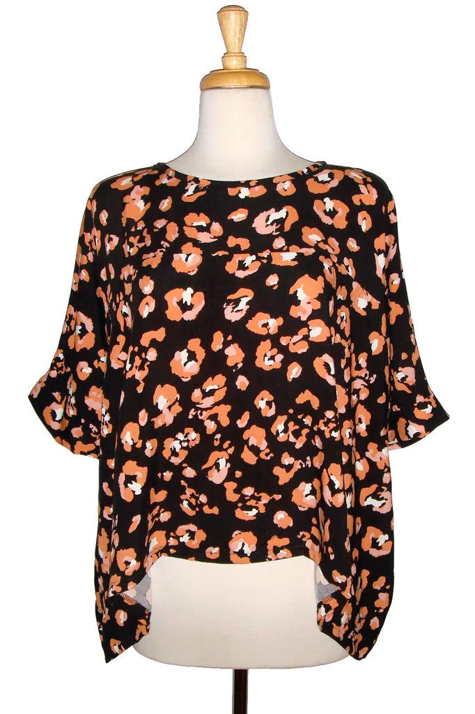 Chloe Top by Desserts and Skirts, Peach Leopard, front view, round neck, bat-wing sleeve, viscose, sizes XS to XL, made in Toronto