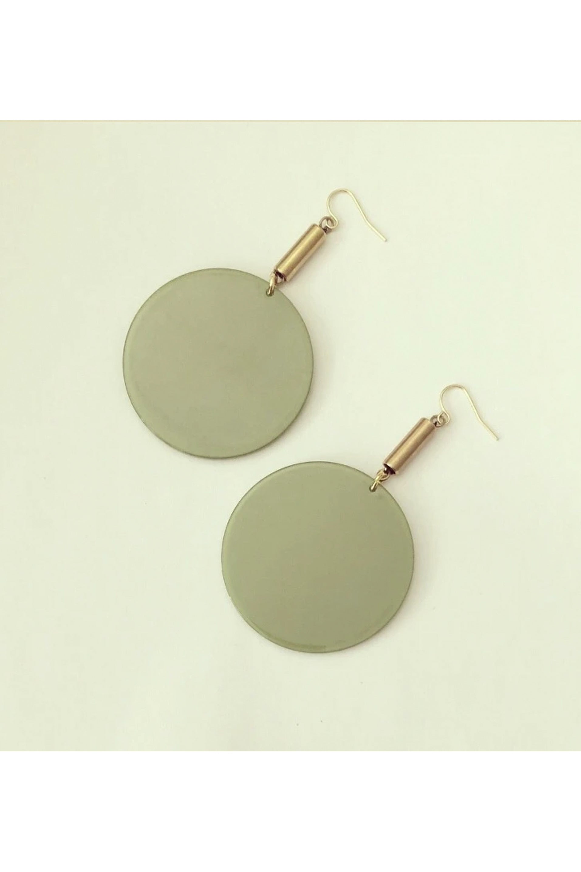 Flumme by Darlings of Denmark; flat lay; dangle earrings; raw brass tubes with green acrylic circle details